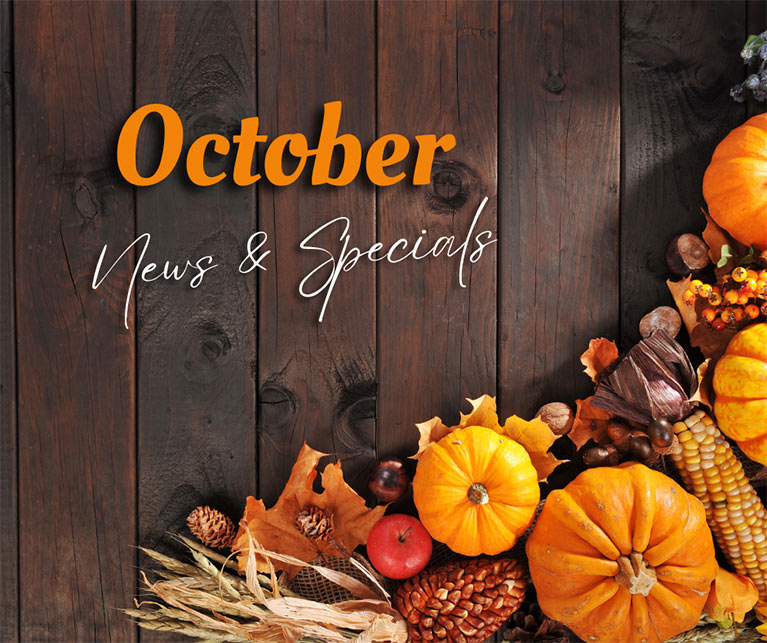 The words "October News and Specials" on a background of fall squash, pinecones and corn.